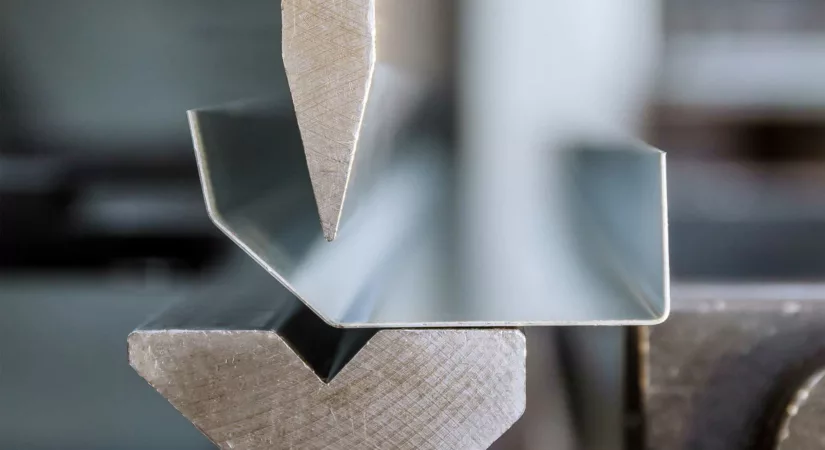 sheet metal bending into shape at a machine shop
